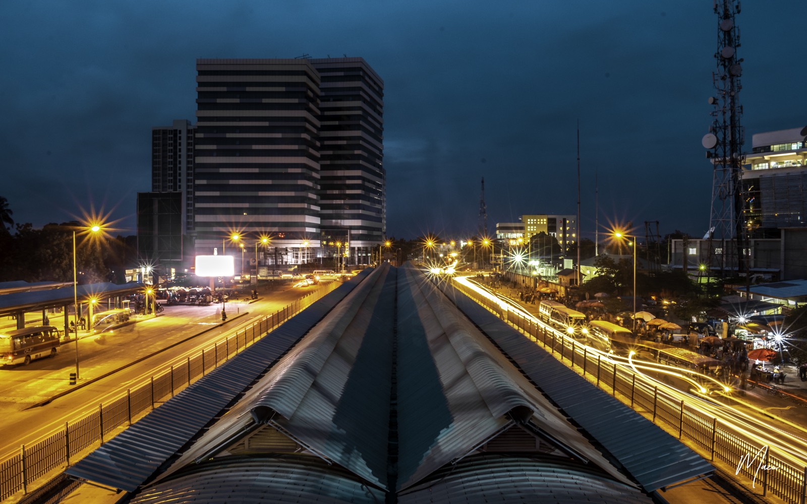 A Dart rapid bus station lit up at night, Dar es Salaam